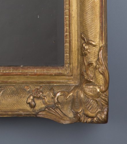 XVIIIe siècle - Miroir en bois doré d'époque Régence