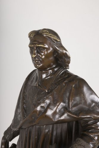 A bronze figure of Bossuet by Albert-Ernest Carrier Belleuse - 