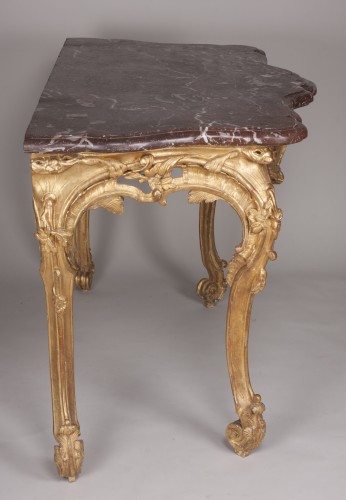 XVIIIe siècle - Console quatre pieds en bois doré d'époque Régence