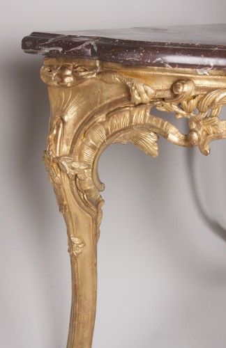 Régence - Console quatre pieds en bois doré d'époque Régence