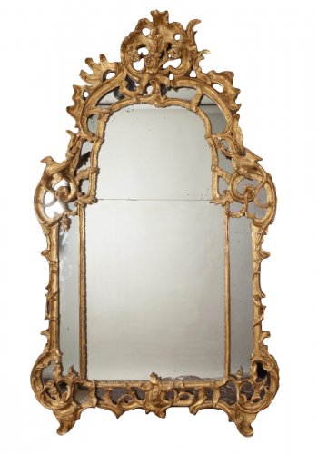 Miroir d’époque Régence en bois doré aux chimères