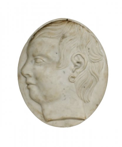 marble medallion depicting a young man