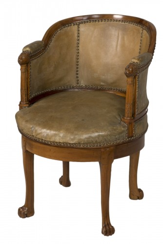 Spinning blond mahogany chair with leather