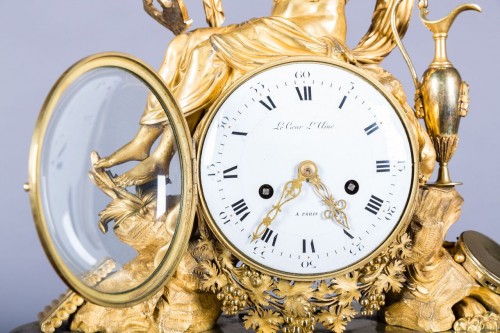 19th century - Gilt bronze clock representing Bacchus holding the thyrsus