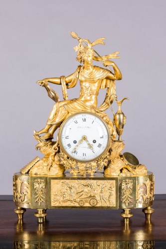 Pendule en bronze doré représentant Bacchus tenant la thyrse - Empire