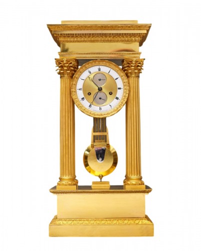 Régulateur de table de la fin de l’époque Empire par Comminges