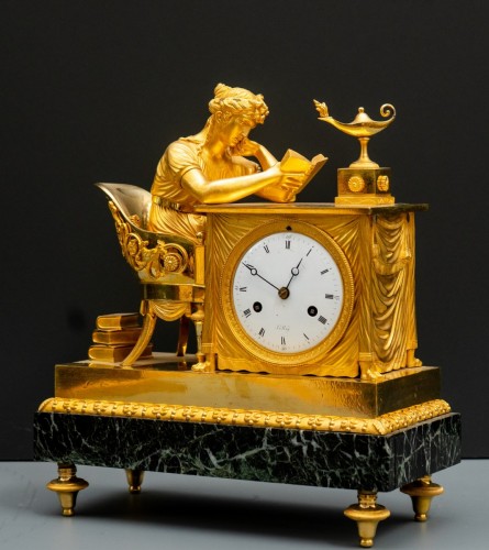 An Empire gilt bronze mantel clock "La Liseuse", the dial signed Le Roy - 
