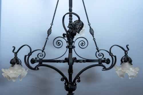 Lighting  - Four lights Art Nouveau wrought-iron chandelier, France circa 1910