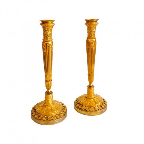 Pair of Empire ormolu torch candlesticks