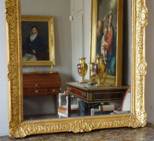 Régence - Miroir en bois sculpté et doré, époque Louis XIV Régence 