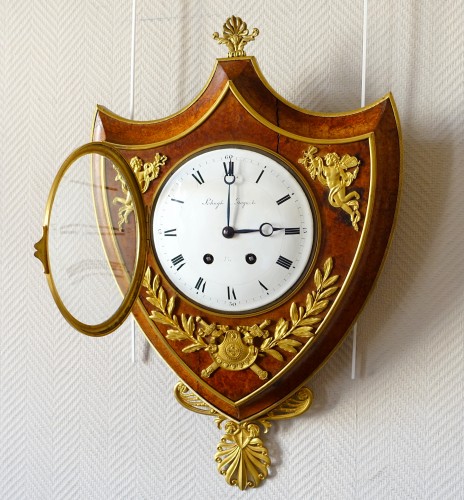 Empire cartel clock in escutcheon - Restauration - Charles X