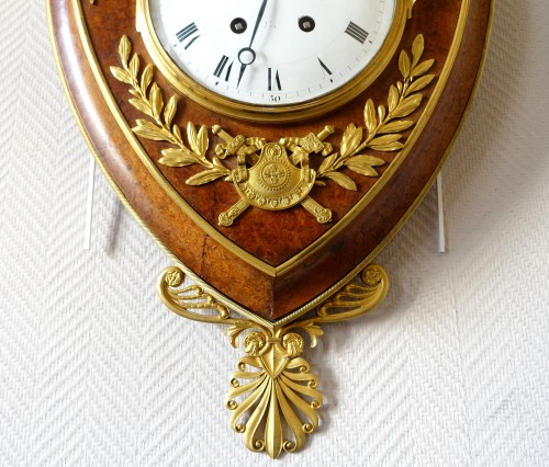 Restauration - Charles X - Empire cartel clock in escutcheon