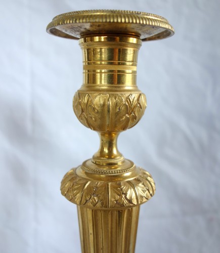 Paire de bougeoirs flambeaux Louis XVI en bronze doré - GSLR Antiques