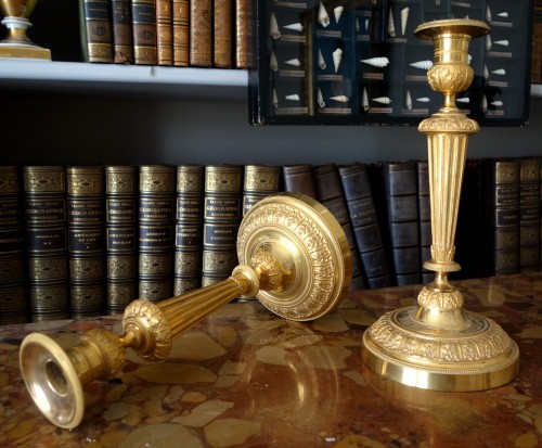 Antiquités - Paire de bougeoirs flambeaux Louis XVI en bronze doré