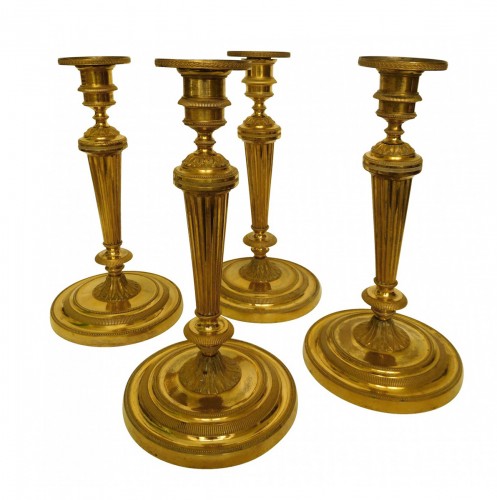 Set of  Louis XVI ormolu candlesticks attributed o Claude Galle