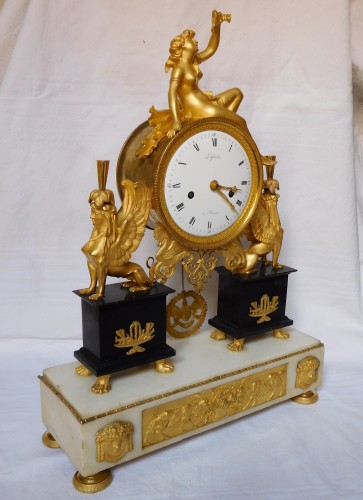 Horology  - French late 18th century ormolu and marble clock