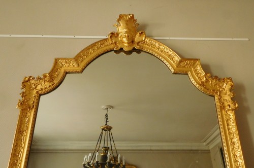 Grand miroir en bois sculpté et doré, époque Régence - Régence