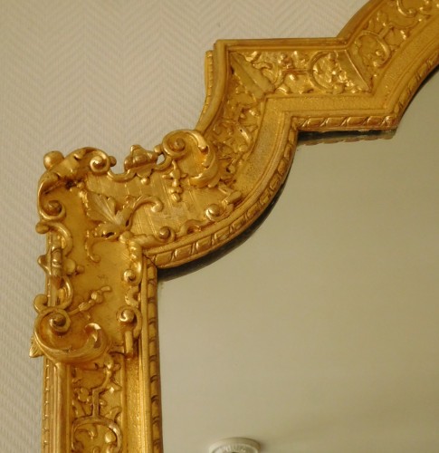 Antiquités - Grand miroir en bois sculpté et doré, époque Régence