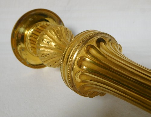 Antiquités - Paire de flambeaux en bronze doré fin XVIIIe siècle