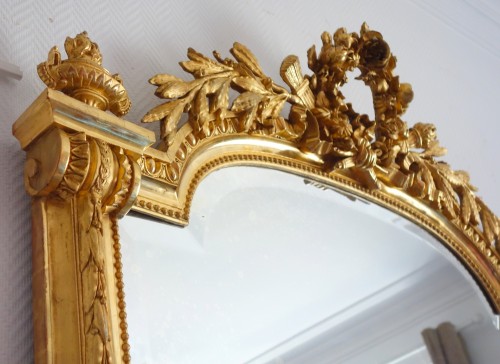Louis XVI - Miroir de cheminée en bois doré