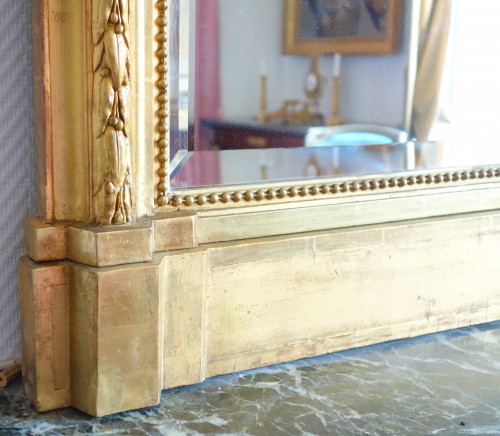 Antiquités - Miroir de cheminée en bois doré