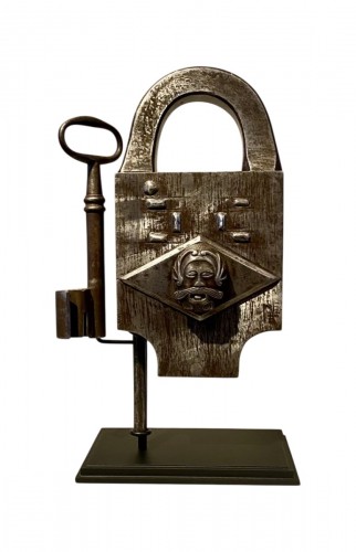 Cadenas en fer de la fin du XVIIe siècle à mascaron de chevalier