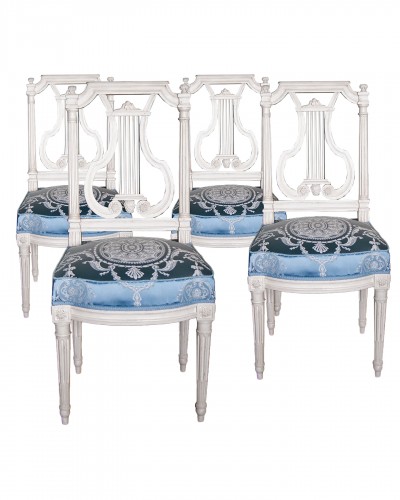 Suite of four Louis XVI dining chairs