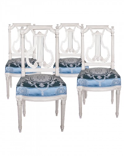 Suite de quatre chaises Louis XVI