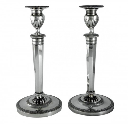 Pair of Empire candlesticks by Ravrio