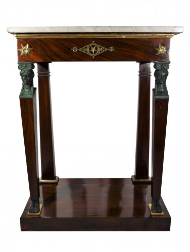 A small Empire console