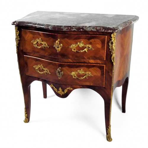 A Louis XV chest of drawers stamped by P Roussel, 18th century