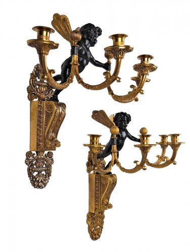 A pair of sconces by Ravrio