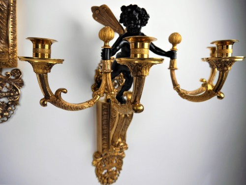 Antiquités - A pair of sconces by Ravrio