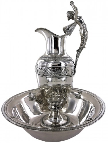 An ewer and its basin in silver, Empire style, 19th century