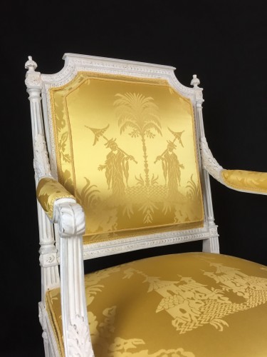 A pair of Louis XVI armchairs by Chevigny - 