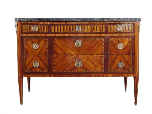 A Louis XVI chest of drawers stamped Roux