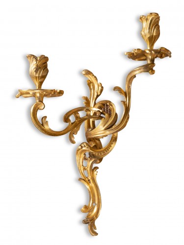 Lighting  - A pair of Louis XV ormolu two- light appliques