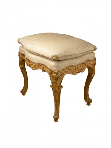 Régence period stool in gilded wood