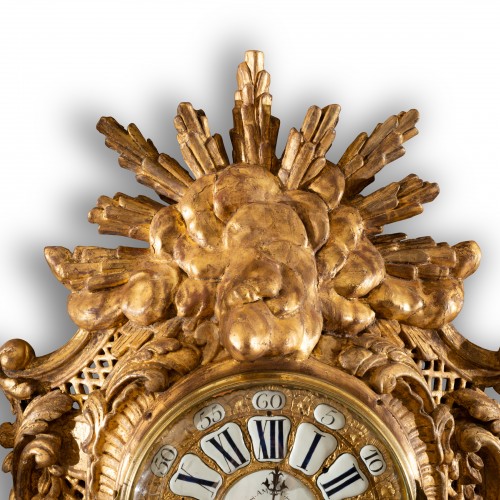 Antiquités - A giltwood Cartel  clock  circa 1730