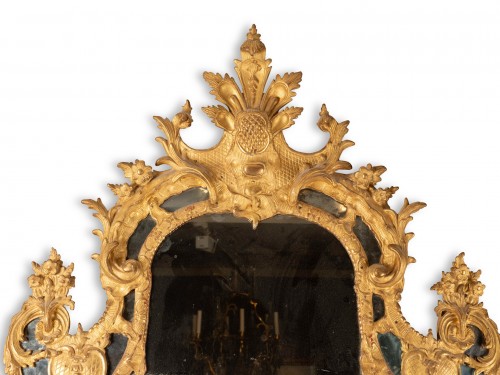 A gilded Mirror Early Louis XV period - Mirrors, Trumeau Style Louis XV