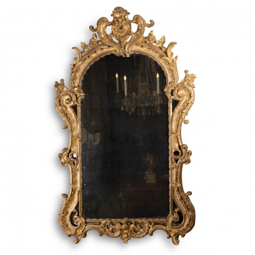 Miroir en bois sculpté doré d'époque Louis XV