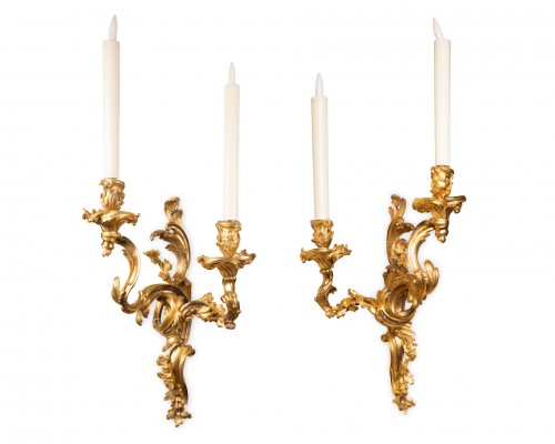 A pair of Louis XV Ormolu twin-branch Wall lights