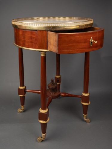 Furniture  - A Louis XVI  ormolu-mounted mahogany Gueridon