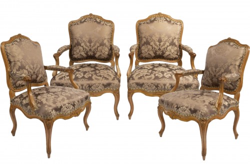 A set of four Louis XV  fauteuils à la Reine stamped Henri Amand