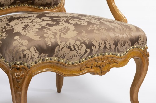 A set of four Louis XV  fauteuils à la Reine stamped Henri Amand - 