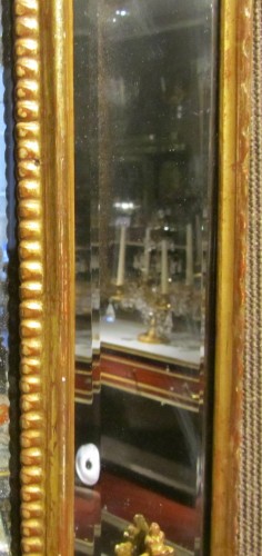 XVIIIe siècle - Grand miroir époque Régence en bois doré