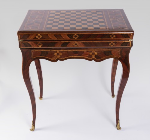 A Louis XV ormolu-mounted Games Table - 