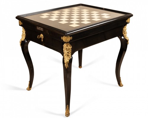 A Regence blackened pearwood games table