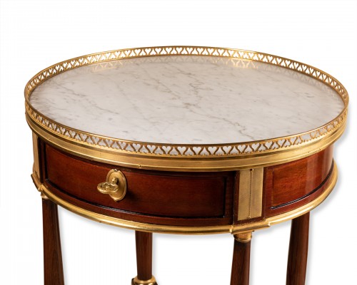 A late Louis XVI ormolu-mounted Mahogany Gueridon  - Louis XVI