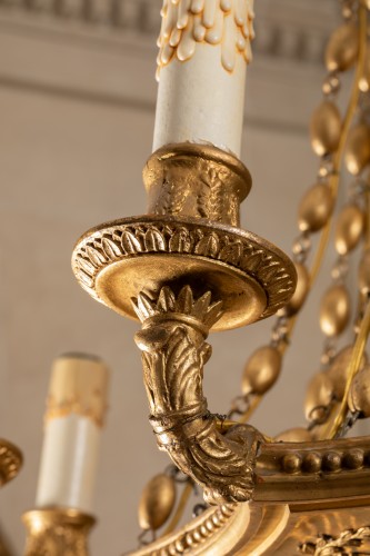 Luminaires Lustre - Lustre en bois sculpté et doré tout début XIXe siècle